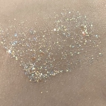 Sparkly Normal It's sparkly and pretty, exactly the color I wante...